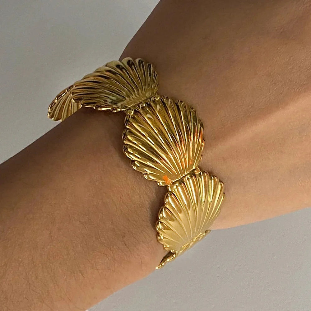 Pulseira Concha Dourada Uworld - Elegância Oceânica