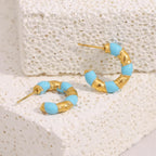 Brinco E.B.belle Gota de Óleo Azul Banhado a Ouro 18K