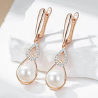 Brincos Longos de Pérola com Ouro Rosa 585 e Zircônia